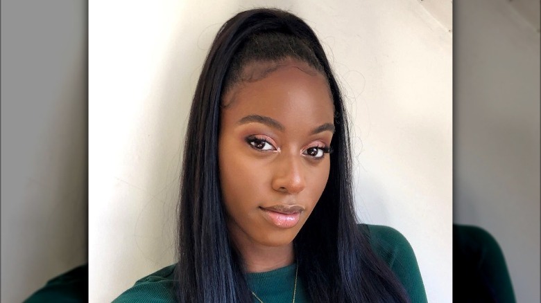 Slicked-back high ponytail