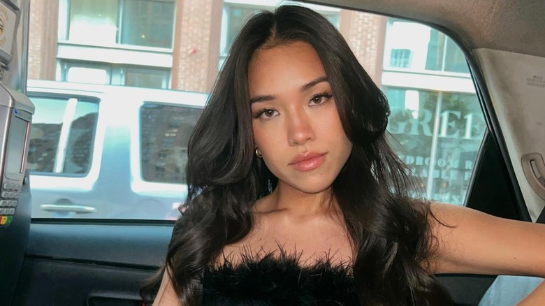 Woman with long layered hair