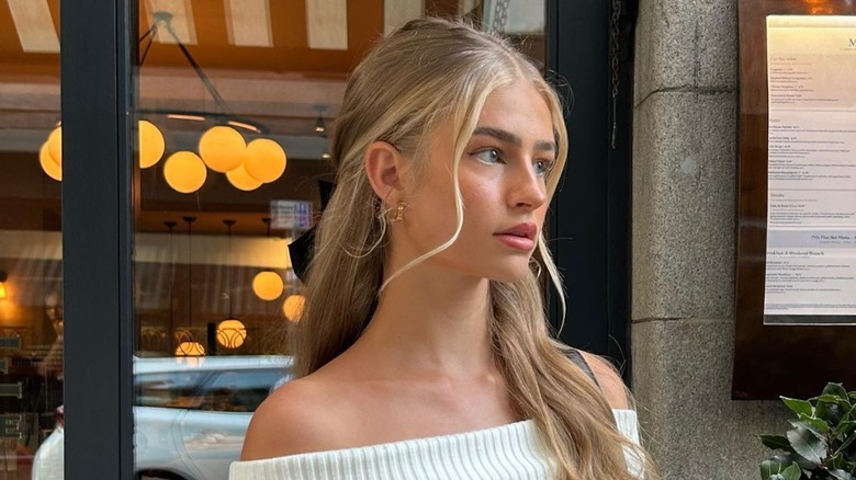 Half-up half-down with wispy strands