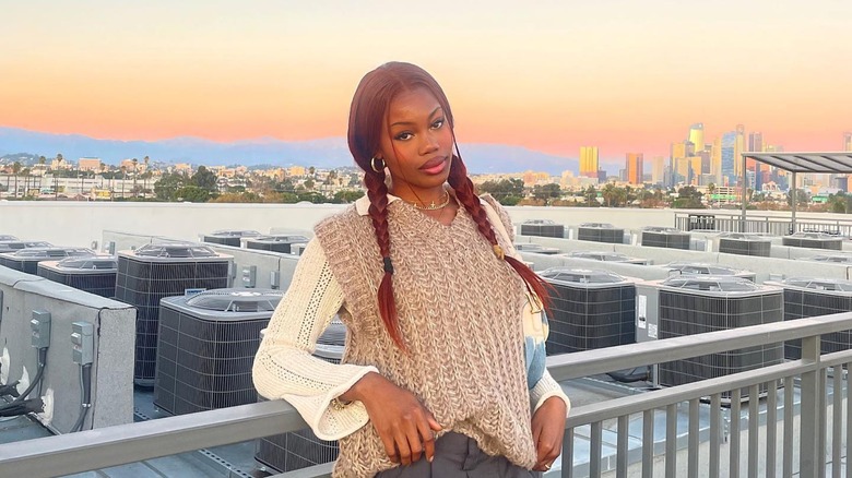 Woman with red pigtails