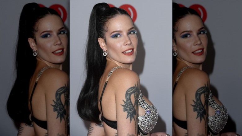 Halsey arrives at an iHeartRadio Music Awards in 2022