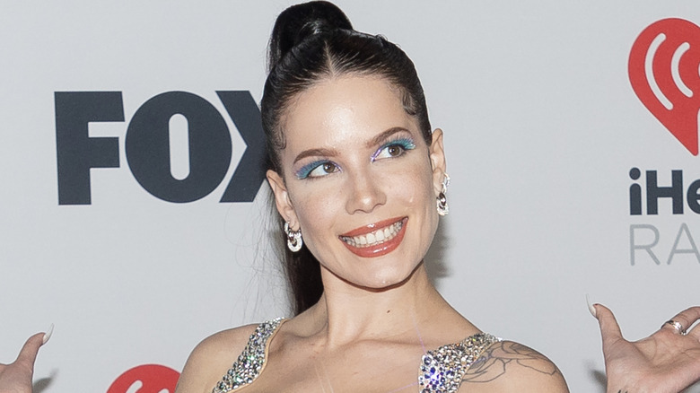 Halsey posing at the iHeart Radio concert