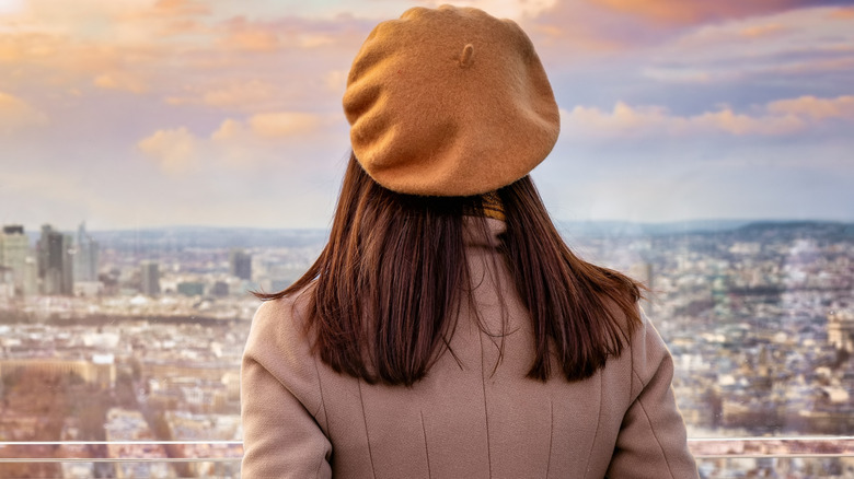 A woman wearing a beret hat.