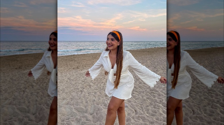 Girl wearing skinny orange headband