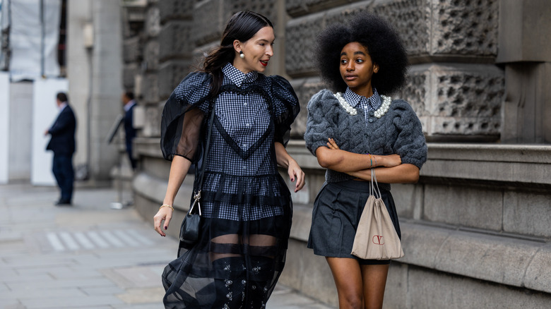 women wearing high fashion looks