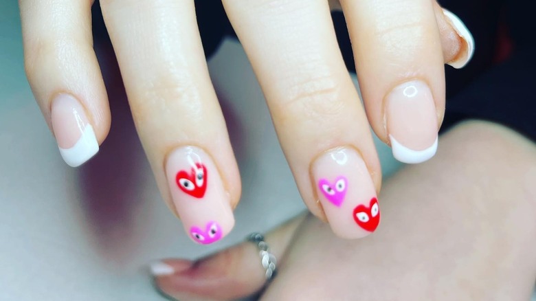 Heart nail art with eyes
