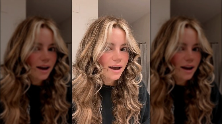 Woman with curly hair and frizz