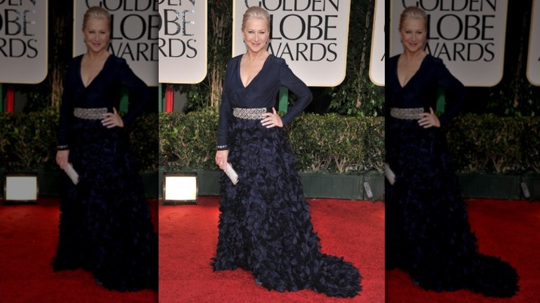 Helen Mirren poses in a navy dress at the Golden Globes