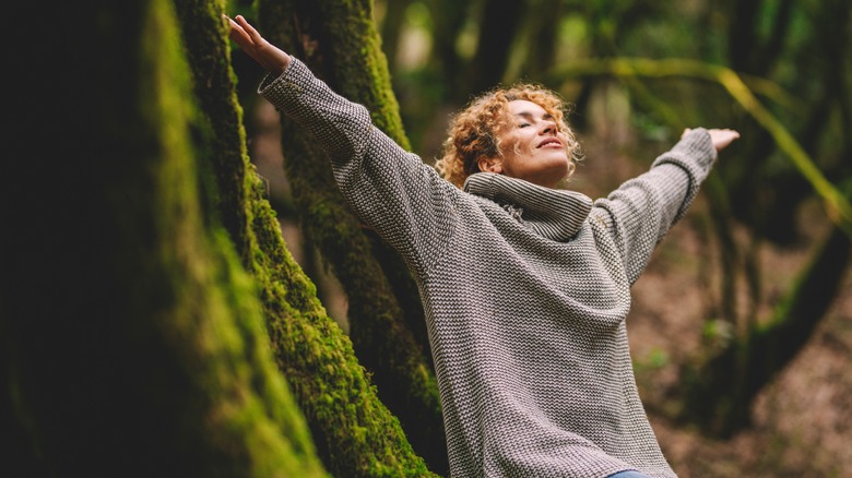Woman enjoying woods