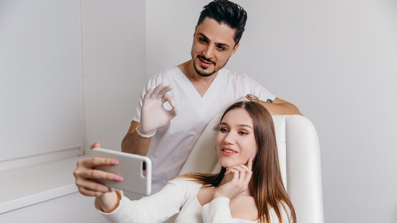 Woman discussing procedure with doctor