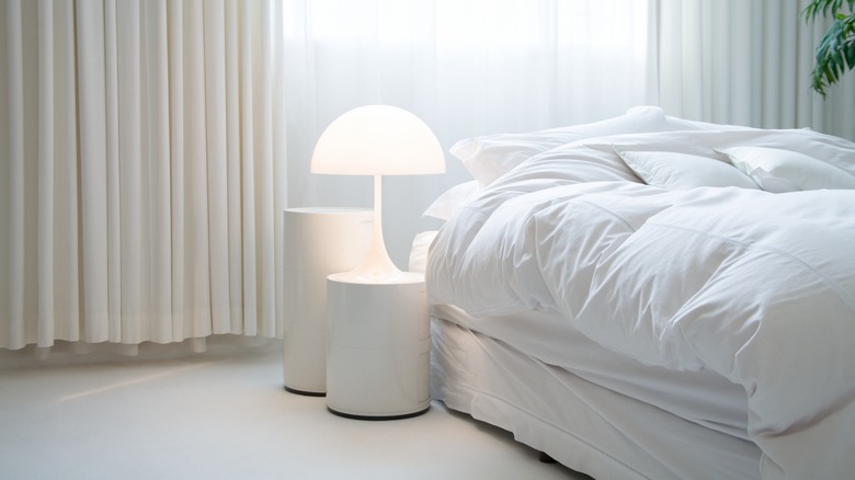 white bedroom with white bed