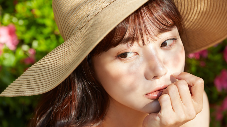 Woman wearing a sun hat