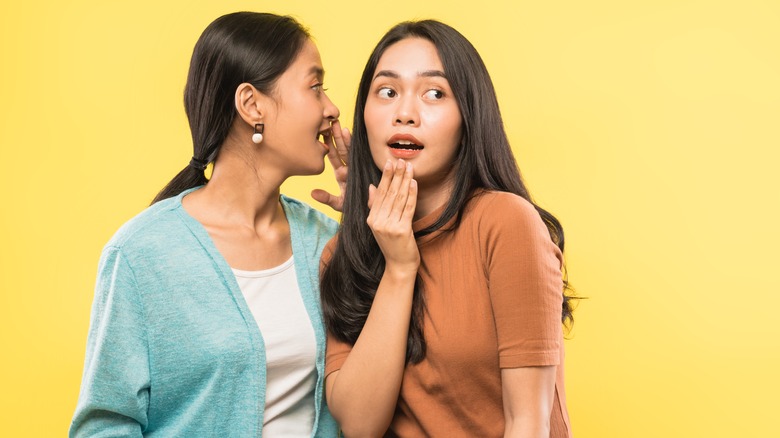 two women gossiping