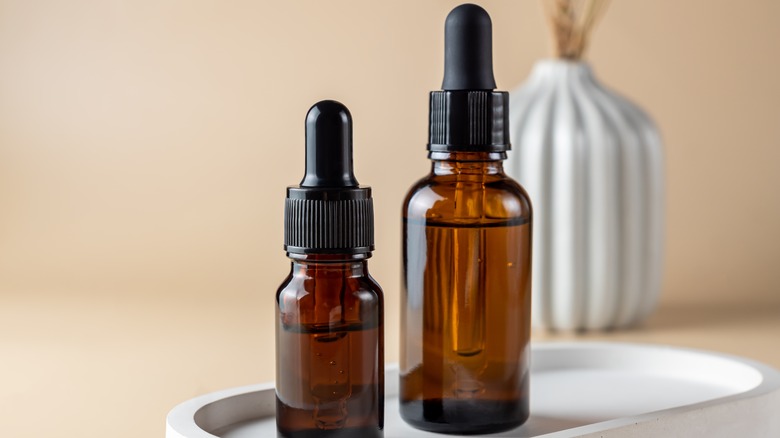 dark serum bottles with droppers