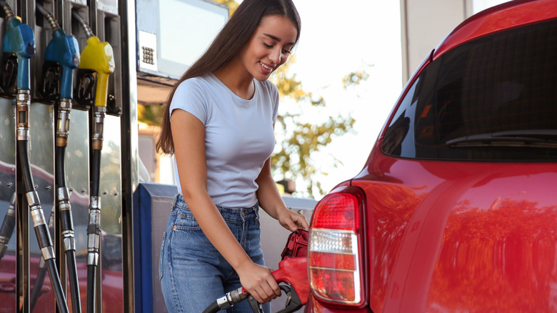 woman at gas station