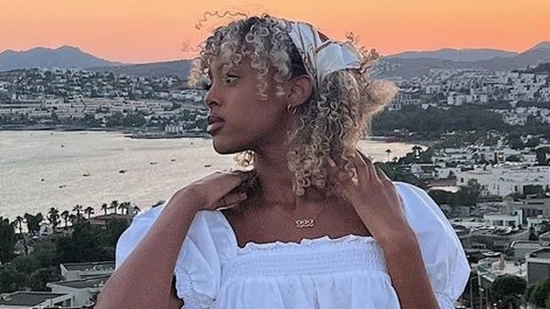 Curly hair with curtain bangs and bandana