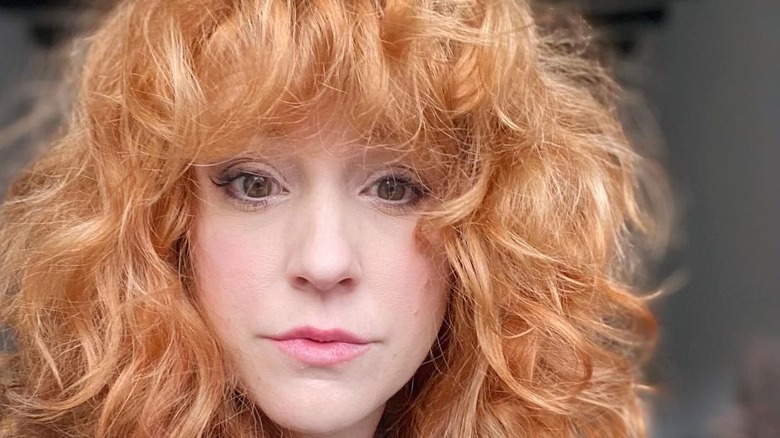 Big, fluffy wavy bangs