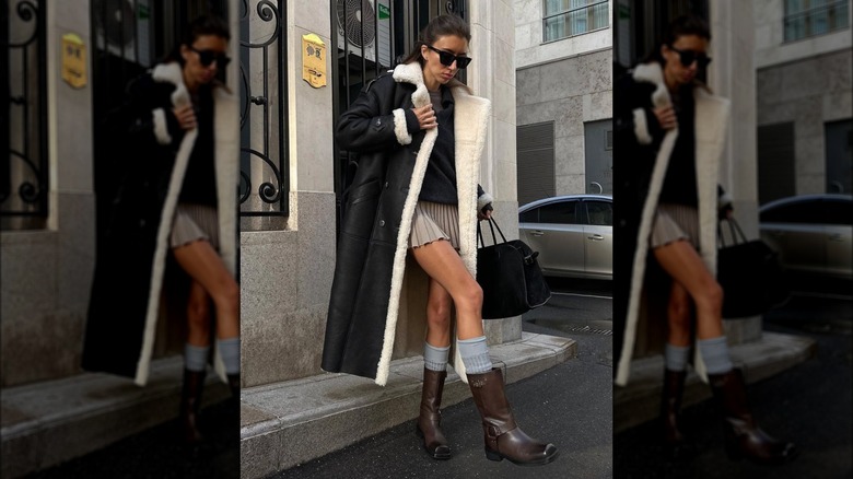 girl wearing fluffy coat with miniskirt