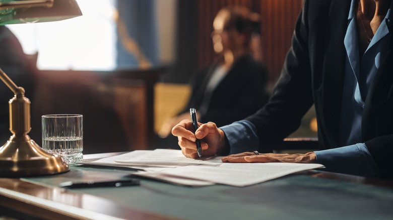 Person signing a document