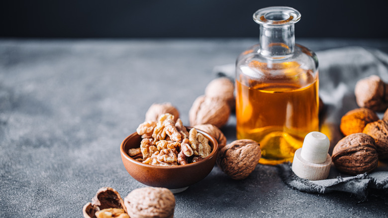 Oils and walnuts on a table 