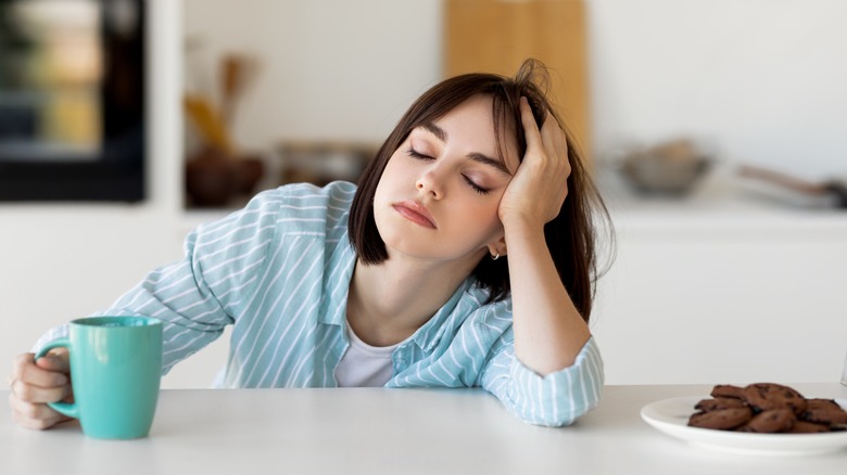 Tired woman slumped over