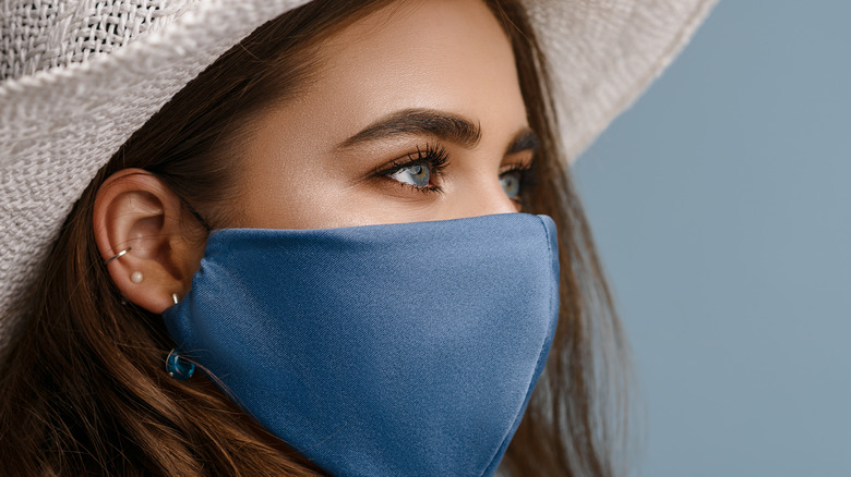 female blue face mask