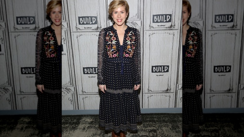 Erin Napier wearing a printed black dress