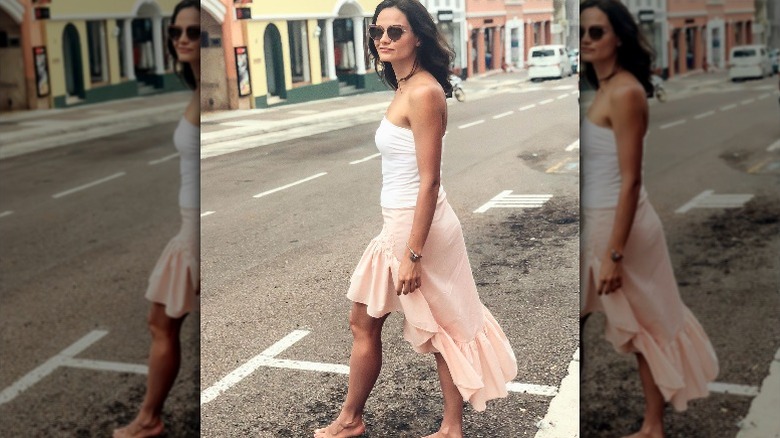 Girl wearing pink high-low skirt