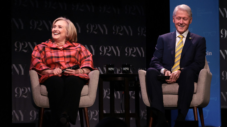 Hillary Clinton and Bill Clinton laughing