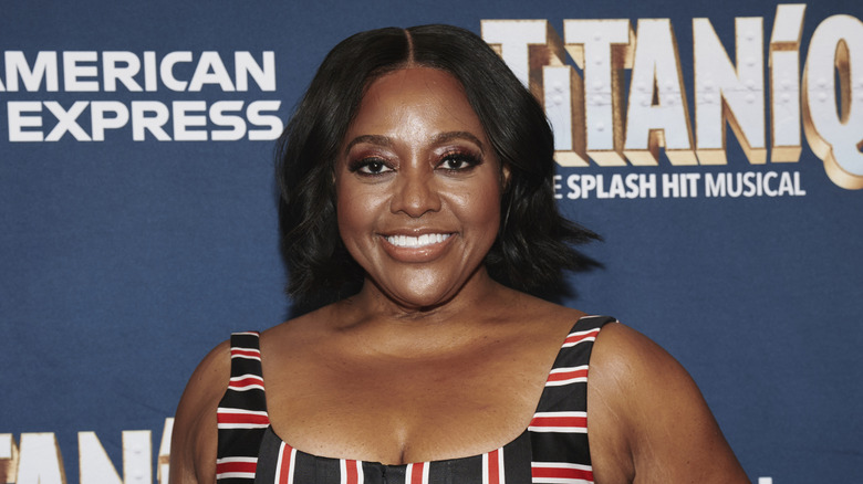 Sherri Shepherd wearing a striped dress