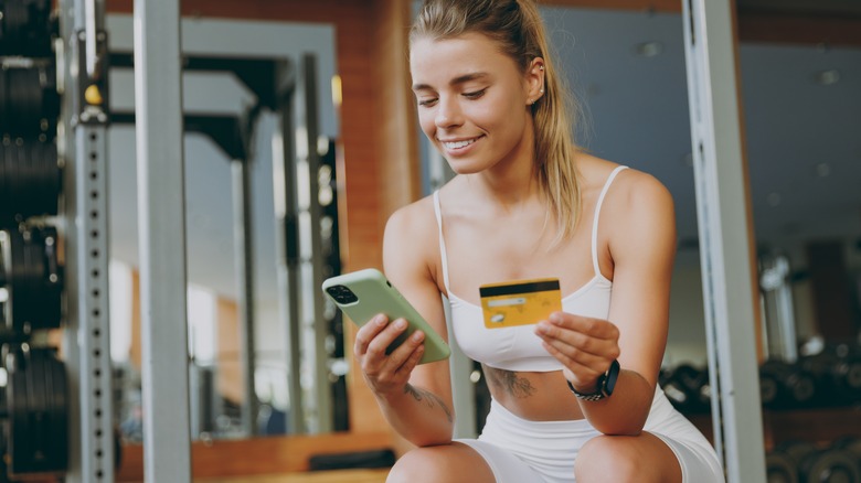 Woman buying a gym membership
