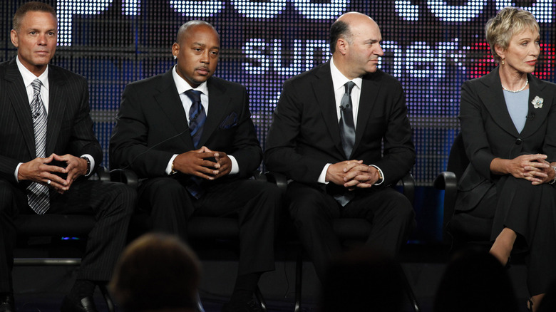 Kevin Harrington, Daymond John, Kevin O'Leary, and Barbara Corcoran seated during a "Shark Tank" press tour