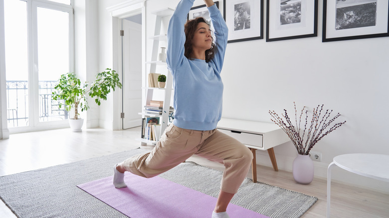 Woman doing yoga at home