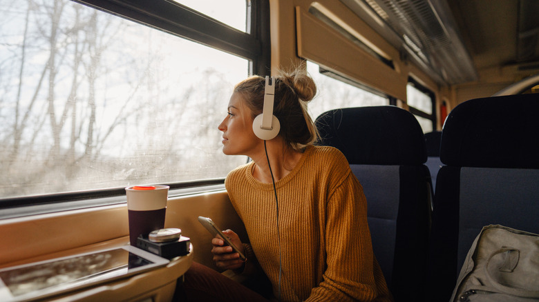 woman riding train