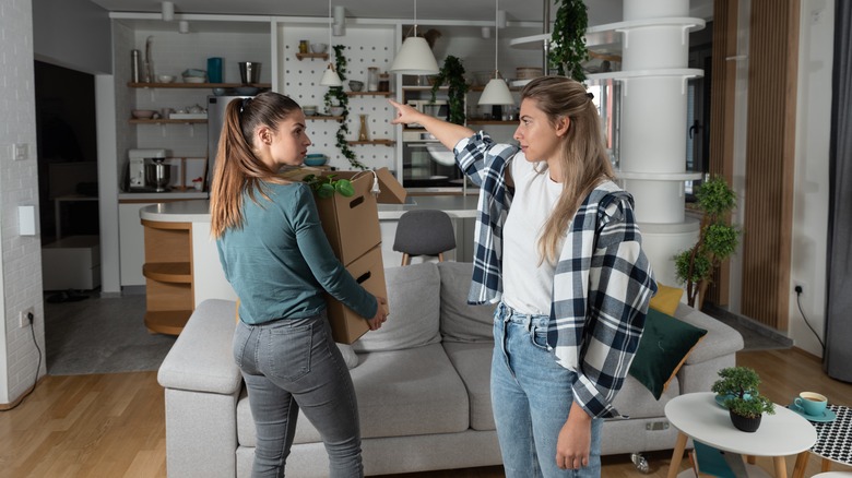 woman kicking out partner