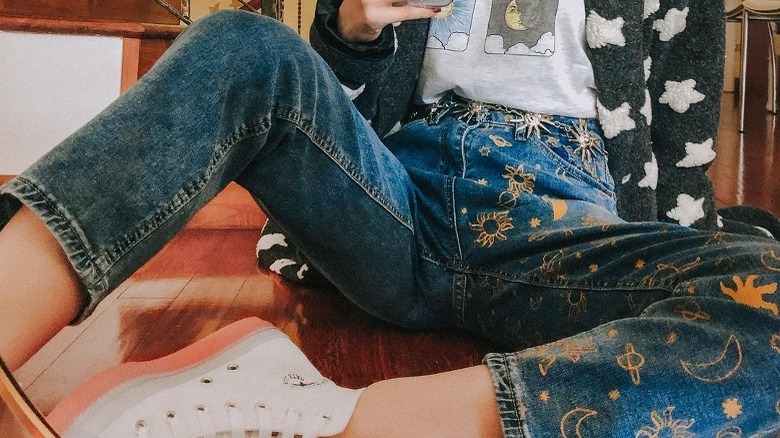 woman jeans yellow floral pattern