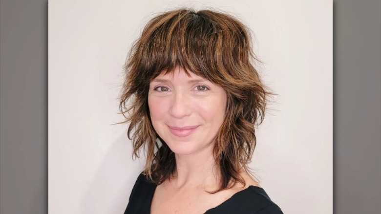 person with a medium-length haircut