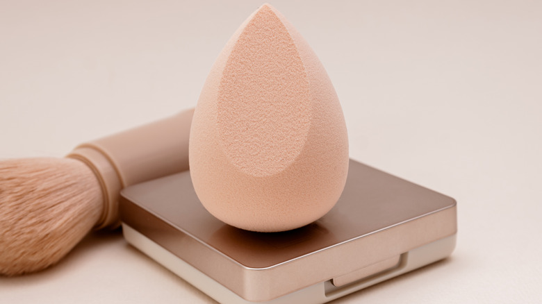 makeup sponge on top of beauty product
