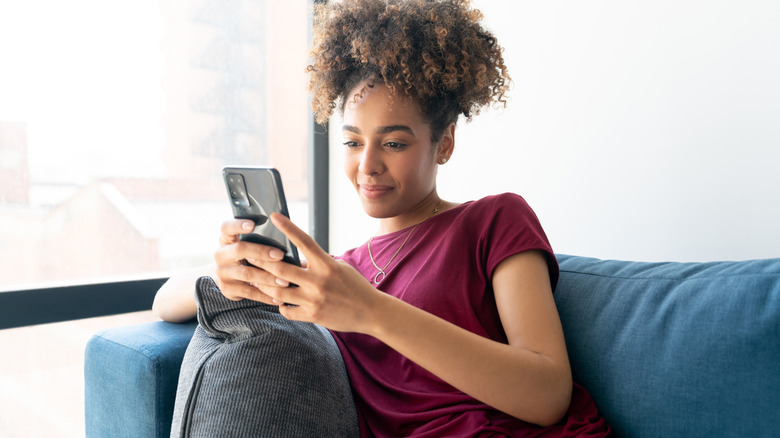 woman using smartphone