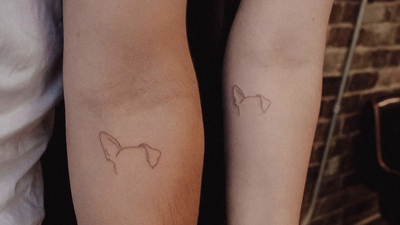 matching dog ear tattoo