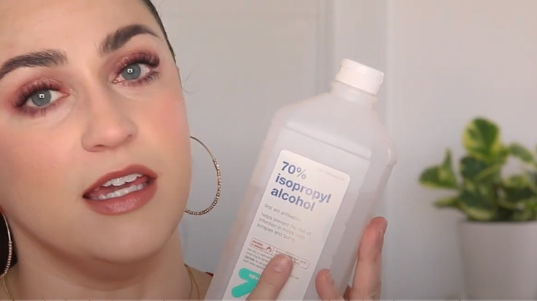 Ivy Boyd holding alcohol