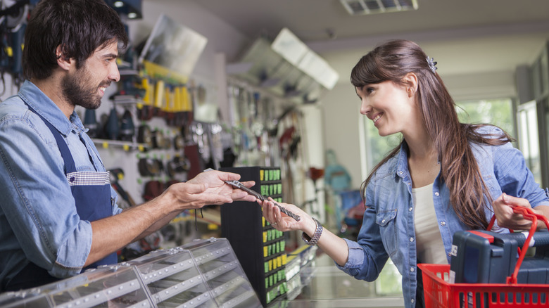 Woman and man in hardware store