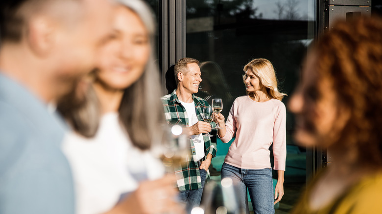 Groups of people celebrating at home