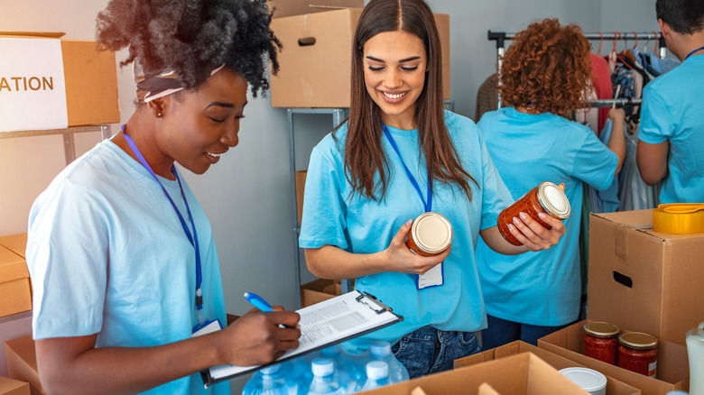 Volunteers organizing donation boxes