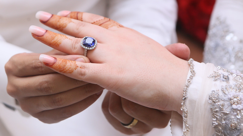 Henna on hands and ring