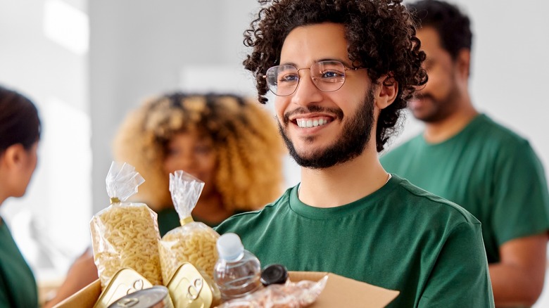 person doing volunteer work smiling