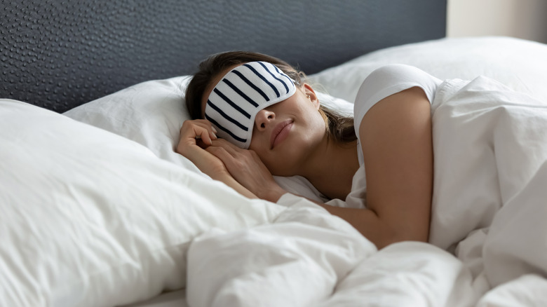 woman sleeping with eye mask