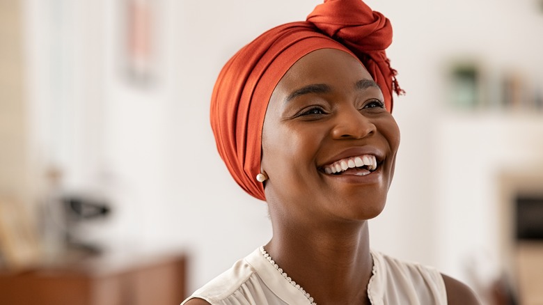 Woman beams with joy