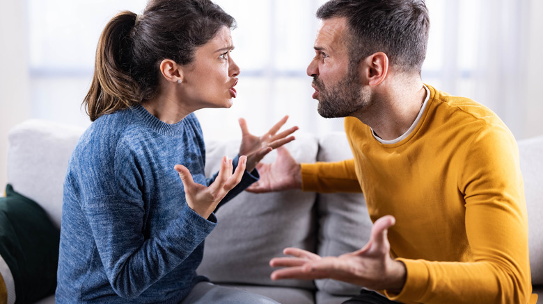 Woman and man fighting