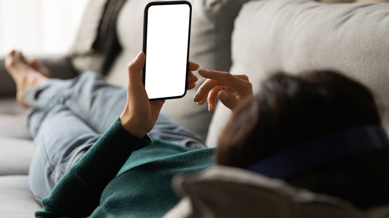 woman checking her phone
